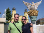 Standing in front of some fountain for the early Hungarian settlers in front of some church